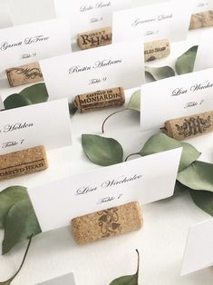 wine cork place cards with leaves on them