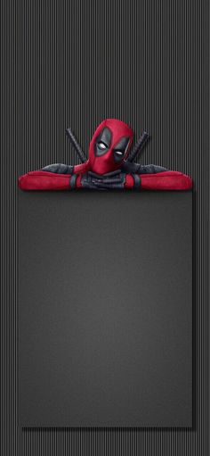 a deadpool character holding a black board