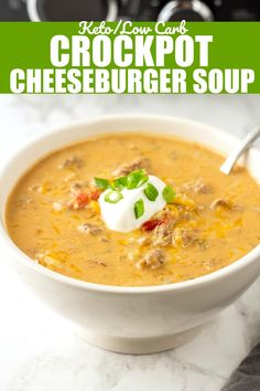 a bowl of crockpot cheeseburger soup with sour cream on top