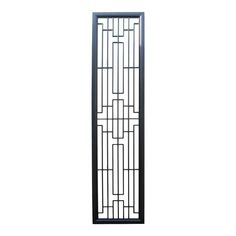 a tall black metal screen with an intricate design on the front and back side, against a white background