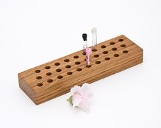 A chic and handy perfume sample holder that keeps organized and seen your perfume, cologne, fragrance or essential oil samples. The sample organizer holds 30 vials up to 0,35/0,43 (9/1,1mm) in diameter. The holes are arranged in laterally offset relationship with one another and provide Diy Perfume Organizer, Diy Fragrance, Perfume Storage, Perfume Sample, Perfume Organization, Fragrance Cologne, Wooden Organizer, Roll On Perfume, Perfume Samples