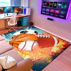 a living room filled with furniture and a flat screen tv mounted to the side of a wall