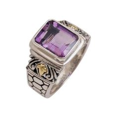 Kadek Wijanegara handcrafts this bold beautiful single-stone ring. Crowned with a dazzling amethyst the engraved band is made from sterling silver with 18k gold accents. The rectangular amethyst weighs 2.5 carats. Rectangular Amethyst Ring For Gift, Amethyst Rings With Rectangular Stone For Gifts, Rectangular Amethyst Jewelry With Accent Stones, Fine Jewelry Amethyst Ring With Gemstone Accents For Gift, Heirloom Amethyst Ring With Gemstone Accents As Gift, Luxury Rectangular Amethyst Ring As A Gift, Luxury Rectangular Amethyst Ring Gift, Luxury Rectangular Amethyst Ring For Gift, Single Stone Ring