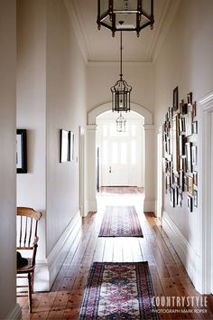 the hallway is clean and ready for us to use as an entrance way in this house