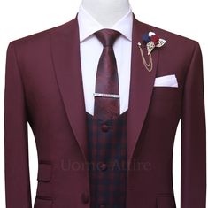 Look your best on any special occasion with a custom burgundy 3 piece suit. Made from premium quality wool suiting fabric and featuring a classic peak lapel, single button front closure, and double flapped pockets, this suit is sure to turn heads. A checkered vest adds a touch of elegance and sophistication, making it the perfect suit for weddings, proms and other formal events. Features: Made from premium quality wool suiting fabric. Classic peak lapel Single button front closure Double flap po 3 Piece Suit For Men, Checkered Vest, Checker Vest, Waistcoat Designs, Formal Attire For Men, Vest Suit, Custom Made Suits, Trouser Design, Suit For Men