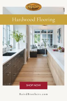 a kitchen with hardwood floors and white counter tops, along with the words hardwood flooring shop now