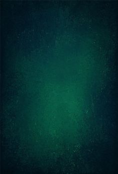 a dark green background with lots of spots