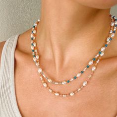 Introducing the Eliza Pearl Blue Bead Necklace, a highlight of our Summer Collection. This necklace features luminous freshwater pearls interspersed with vibrant blue beads and gold accents, capturing the essence of summer's elegance and charm. Perfect for beach outings, summer parties, and everyday wear. Freshwater Pearl, blue quartz beads and 14k gold plated beads. Pearl size 5 mm x7 mm & 3 mm ( smaller pearls ). Size might vary among the freshwater pearls. Metals are made of 14K gold plated o Pink Bead Necklace, Pearl Pink, Forever Jewelry, Gold Gifts, Gold Necklace Women, Quartz Beads, Jewelry Ring Box, Blue Quartz, Pink Beads