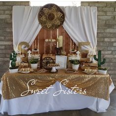 a table topped with lots of cake and desserts