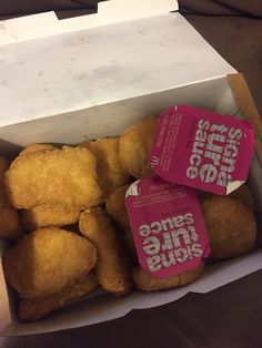 some kind of food in a box on a table