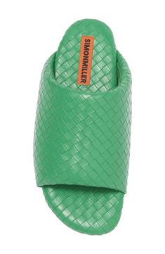 Supple faux-leather strips are woven to form the wide, puffy upper strap of this exceptionally comfortable slide sandal. Textile upper and lining/rubber sole Imported Green Leather Slides With Cushioned Footbed, Synthetic Woven Leather Slide Sandals, Designer Synthetic Slides Slip-on, Designer Synthetic Slip-on Slides, Open Toe Synthetic Slides With Woven Leather, Synthetic Woven Leather Open Toe Slides, Synthetic Open Toe Woven Leather Mules, Synthetic Open Toe Mules With Woven Leather, Open Toe Synthetic Woven Leather Mules