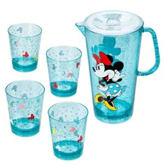 a set of four mickey mouse glasses and pitcher