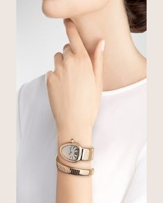 Find BVLGARI Serpenti Tuboga 35mm 18k Rose Gold Diamond Coil Watch on Editorialist. Serpenti Tubogas diamond watch by BVLGARI. 35mm 18karat rose gold case and hardware. Segmented strap coils around the wrist. Round brilliantcut diamonds at bezel. Pink rubellite cabochon winding crown. Guilloché opaline dial with logo text. Baton and Roman numeral indices. 0.29 total diamond carat weight. 0.108 total rubiellite carat weight. Twohand quartz automatic movement. Made in Switzerland. Timeless Rose Gold Watches With Bracelet Strap, Elegant Rose Gold Diamond Watch With Bracelet Strap, Elegant Rose Gold Watch With Bracelet Strap, Elegant Rose Gold Watch Bracelet Strap, Rose Gold Jewelry And Watches For Formal Occasions, Designer Rose Gold Watches With Diamond Hour Markers, Bvlgari Watch, Gold Diamond Watches, Bvlgari Serpenti