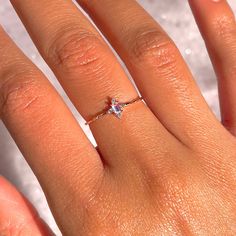 This iridescent ring is something you'll always treasure. We love this dainty ring so much! It's the perfect ring to add to your stack or wear alone when you want to serve some dainty elegance. 18k gold plated, 18k rose gold plated, or rhodium plated over brass with a protective coating Cubic zirconia stones Approx 7mm ring face Available in sizes 6-8 Shop our entire In the Garden Collection here Iridescent Ring, Necklace Chain Lengths, Wrap Rings, Brass Pendant, Jewelry Cleaner, Dainty Ring, Rose Gold Color, Perfect Ring, Jewelry Plate