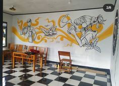 a large mural on the wall of a restaurant