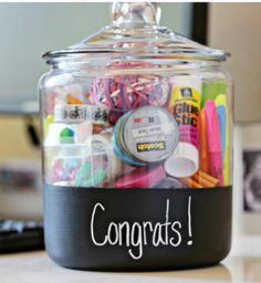 a glass jar filled with lots of different items