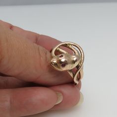 Wonderful estate 14k rose gold ruby eyes snake ring . big and a size 11.25. this ring was sized up at one time. unique beautiful estate ring 1900's. great shape. 6 grams. 19.38mm wide. marked 14k. Collectible 14k Rose Gold Rings, Estate Rings, Red Band, Snake Ring, Wide Band Rings, Small Hands, Wide Bands, Silver Diamonds, Band Ring