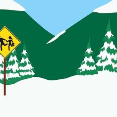 a yellow street sign sitting on the side of a snow covered hill next to trees