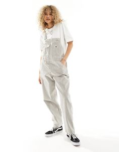 Jumpsuits & Playsuits by Carhartt WIP Go all-in-one Stripe design Classic dungarees design Adjustable buckle straps Buttoned sides Functional pockets Tapered leg Regular fit Carhartt Jumpsuit Women, Carhartt Overalls Women Outfit, Carhartt Dungarees Women, Womens Carhartt Overalls, White Carhartt Overalls, Womans Carhartt Overalls, Carhartt Striped Overalls, Style Goals