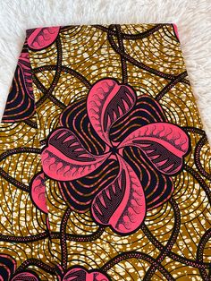 This brown and pink African Fabric is high quality African print made from 100% cotton and it's 45 inches wide. It is used for making African Clothing, African quilts, & For Home decoration. FYI: Print is Double sided. The listing is for 1, 6 yards and Headwrap Each piece of fabric measures:  36in by 45in for 1 yard 216in by 45in for 6 yards 70in by 22in for Head wrap If you purchase more than one yard, you will receive one continuous piece. *If you require more than what I have listed, feel fre Traditional Pink Cotton Fabric, African Quilts, Clean And Press, Brown And Pink, African Print Fabric, African Fabric, African Dress, African Clothing, Print Fabric