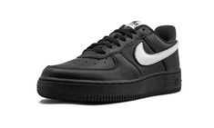 The Nike Air Force 1 Low is a retro style released by the Swoosh brand on September 28, 2019.  Bringing back an old school look that dates back to the 1990s, the lifestyle silhouette is dressed in a simple black and while color palette.  An upgraded premium leather material covers the upper and a double-layered Swoosh logo — one black, one white — is featured on the lateral side.  A white tongue tag and heel tab also add contrast to the mostly black sneaker. Nike Retro Custom Sneakers For Streetwear, Nike Air Force 1 Casual Streetwear, Nike Air Force 1 Casual Streetwear Shoes, Nike Air Force 1 Urban Streetwear With Gum Sole, Nike Air Force 1 With Gum Sole For Streetwear, Casual Black Nike Air Force 1 For Streetwear, Nike Air Force 1 Black Casual, Nike Air Force 1 Black Urban Streetwear, Nike Retro Black Sneakers