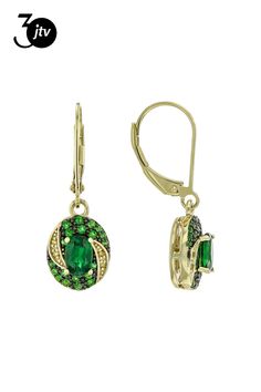 1.16ctw Chrome Diopside With 0.03ctw Round Yellow Diamond 18k Yellow Gold Over Sterling Silver Earrings. Measures Approximately 0.44"L x 0.37"W. Green Cubic Zirconia Oval Earrings, Oval Green Cubic Zirconia Earrings, Green Oval Cubic Zirconia Earrings, Yellow Diamond, Sterling Silver Earrings, Silver Earrings, Yellow Gold, Sterling Silver, Yellow