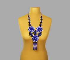 A blue flower necklace is a stylish and original decoration. A boho bead necklace will make you more tender and sophisticated. A hippie bead necklace will be a wonderful birthday gift for sister. Despite the size, the seed bead necklace is not heavy. ❤️ A flower necklace is suitable for any look and is easily combined with clothes of different styles. All beaded jewelry in our assortment is unique. Each product has its own style and original design. Nevertheless, many pieces of jewelry are easil Bohemian Blue Jewelry With Handmade Flowers, Blue Flower-shaped Bohemian Necklace, Blue Bohemian Flower Necklace, Blue Bohemian Flower Beaded Necklaces, Bohemian Blue Flower Necklace, Handmade Blue Flower Beaded Necklaces, Blue Flower-shaped Beaded Necklaces With Colorful Beads, Handmade Blue Flower Beaded Necklace, Blue Flower-shaped Beaded Necklaces