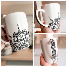 a hand holding a coffee mug with black and white designs on the outside, inside and out