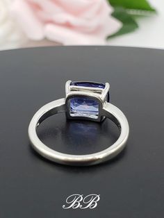 Sterling Silver Rings With Rectangular Stone For Formal Occasions, Sterling Silver Rings With Rectangular Stone For Formal Events, Formal Sterling Silver Ring With Rectangular Stone, Sterling Silver Ring With Rectangular Stone For Formal Events, Classic Tanzanite Jewelry, Classic Baguette Cut Sapphire Jewelry, Square Cut Sapphire Jewelry For Formal Occasions, Square Cut Sapphire Fine Jewelry, Fine Jewelry Square Cut Sapphire