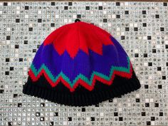 "Vintage 90's 80's Knit winter hat | Vintage Red Purple Green beanie hat | Unisex Condition: Good Vintage Condition Tag says: N/A All items are vintage and previously owned/worn. We try to include all \"imperfections\" in the photos. Thanks for your support!" Retro Winter Hat One Size, Retro One-size Crochet Hat For Winter, Retro Crochet Hat One Size For Winter, Retro Crochet Beanie Hat For Winter, Retro Winter Beanie Hat, Retro Winter Beanie, Retro Winter Crochet Hat, Retro Crochet Hat For Winter, Retro Winter Hat