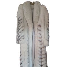 Elevate Your Winter Wardrobe With This Stunning Authentic Schumacher Saga Fox Fur Coat. The Natural White Fox With Coyote Insert Creates A Striking And Luxurious Look That Is Perfect For Any Occasion. This Overcoat Exudes Sophistication And Elegance, Making It A Must-Have For Any Fashion-Forward Woman. The Coat Is Available In Regular Size And Features A Classic Design That Will Never Go Out Of Style. This Coat Is An Investment In Timeless Fashion That Will Keep You Warm And Stylish For Years To Fox Fur Coat, White Fox, Fox Fur, Winter Wardrobe, Out Of Style, Classic Design, Investment, Timeless Fashion, Fur Coat