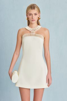 CULT GAIA SERAFINA DRESS IN OFF WHITE Christiana Mini Dress, White Dress Gold Straps, Crepe Short Wedding Dress, Halterneck Dress Accessories, Cult Gaia Cutout Dress, Cool Semi Formal Dresses, Coperni White Dress, Short Greek Inspired Dress, Greek Embroidered Dress