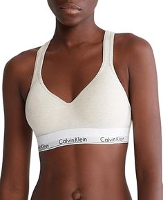 PRICES MAY VARY. Padded cups for supportive lift with a lightweight, breathable feel Easy pullover crossback silhouette with a keyhole opening Soft, flexible logo band retains shape wear after wear Hardware-free, distraction-free For more coverage and a relaxed fit, size up Calvin Klein Bra, Bra For Women, Shape Wear, Everyday Bra, Wireless Bra, Global Design, Calvin Klein Woman, Sporty Look, Body Style