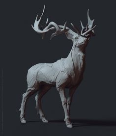 a white sculpture of a deer with antlers on it's head