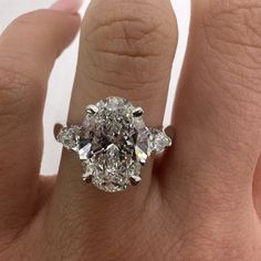 3.07 Carat E Vs2 Oval Lab Grown Diamond Center Stone With Petite Pears And Round Lab Diamond Accenting Totaling To An Additional 0.68 Carats Bringing This Ring To A Total Of 3.75 Ctw. 14k White Gold, Ring Size 7 But Can Be Resized. Lots Of Diamonds Engagement Ring, Giant Engagement Ring, Big Diamond Engagement Rings, Engagement Ring Three Stone, Ring Three Stone, Cushion Engagement Ring, Oval Diamond Engagement, Oval Diamond Engagement Ring, Beautiful Engagement Rings