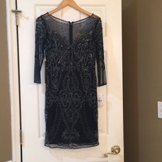 Absolutely Gorgeous. Navy Blue Dress With Beautiful Beading Throughout. Mesh Sleeves. Fully Lined. Elegant Cocktail Evening Dress With 3/4 Sleeves, Elegant Long Sleeve Beaded Evening Dress, Elegant Embellished Dress With 3/4 Sleeves, Long Sleeve Beaded Formal Dress, Pisarro Nights, Dresses Beautiful, Navy Blue Dress, Mesh Sleeves, Navy Blue Dresses