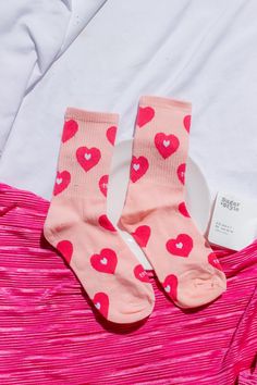 Love Heart Print Socks in Pink Fall head over heels with these cute heart print socks! A pastel pink pure cotton pair of socks with a contrasting bright pink heart pattern all over.  Heart print 100% cotton Fits a UK4-7 or EU34-40 Knitted Coord, Pink Love Heart, Pink Heart Pattern, Micro Bags, Pink Fall, Print Socks, Rose Pastel, Skirt Co Ord, Trending Sunglasses