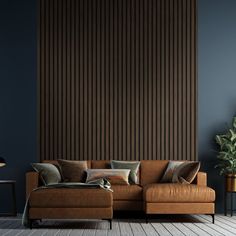 a living room with blue walls and a brown couch in front of a large striped wall