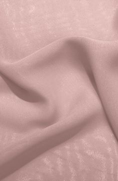 a close up view of a pink fabric