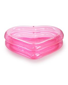 three pink inflatable heart shaped plates on a white background