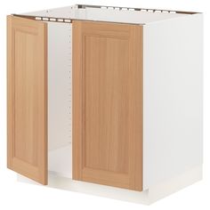 a white cabinet with wooden doors and drawers