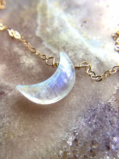 Moonstone Crescent Moon Necklace Rainbow Moonstone Jewelry | Etsy Celestial Moonstone Wire Wrapped Necklaces, Celestial Moonstone Wire Wrapped Necklace, Celestial Wire Wrapped Moonstone Necklace, Celestial Wire Wrapped Moonstone Jewelry, Celestial Moonstone Necklace With Wire Wrapped Details, White Moonstone Crystal Necklace With Moon Charm, Mystical Moonstone Wire Wrapped Necklace, Minimalist Moonstone Crystal Necklace For Healing, Wire Wrapped Teardrop Moonstone Necklace