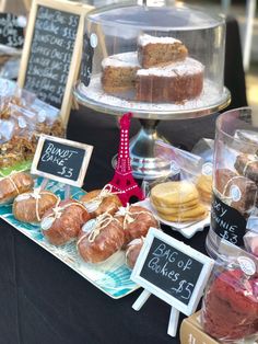 various pastries and desserts on display at an event