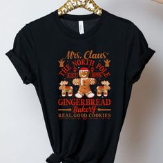 'Christmas is almost here, and what better way to get in the spirit then with our Gingerbread Christmas shirts! So cozy and cute for all of your holiday festivities.). Get yours now at @liamandlore! #bookstagram #bookish #gingerbread #ChristmasShirts #ChristmasFashion #HolidayVibes #FestiveFashion #WearChristmas #ChristmasStyle #HolidayOutfit #AllThingsChristmas #ChristmasShopping Winter Crew Neck Pre-shrunk T-shirt, Short Sleeve Graphic T-shirt For Winter, Winter Graphic Print T-shirt With Short Sleeves, Winter Graphic Print Short Sleeve T-shirt, Relaxed Fit Short Sleeve T-shirt For Holiday, Christmas Graphic Tee With Short Sleeves, Christmas Screen Print Short Sleeve T-shirt, Christmas Graphic Print Short Sleeve T-shirt, Cotton T-shirt For Fall Holiday