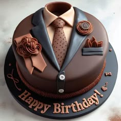 a birthday cake with a suit and tie on it