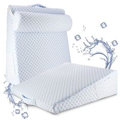 an image of a bed with water splashing out of the pillow and sheets on it