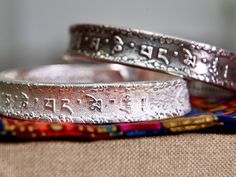 "This heavy Tibetan Mantra Cuff Bracelet is hand-crafted from the finest 999 sterling silver. Our bangle bracelet is available in two colors, Antique finish or original silvery satin finish. Both the inner and outer sides featured Tibetan mantra engraving. The outside showcases an intricate inscription of the six-word mantra \"Om mani padme hum.\" Tibetan mantra Om Mani Padme Hum , it is a powerful Tibetan buddhism mantra , it brings you positive energy , compassion thoughts , good vibes , inner Symbolic Bangle Bracelet For Meditation, Ceremonial Sterling Silver Bangle Bracelet, Spiritual Style, Ceremonial Sterling Silver Bangle For Spiritual Occasions, Unique Engraved Cuff Bracelet As Gift, Unique Engraved Cuff Bracelet For Gift, Spiritual Bangle Bracelet For Ceremonial Occasions, Spiritual Sterling Silver Bracelet Nickel Free, Spiritual Silver Bangle Cuff Bracelet, Spiritual Stamped Sterling Silver Bracelets