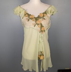 Vintage Green Ruffle Top And Short Set Marked A Size Large, I Can Provide Measurements If Needed! Rare Set By H.S. Miss Salma Beautiful Orange And Green Floral Details On The Bust Comes With The Shorts Which Are Also A Size Large No Flaws! Pretty Bows On The Shorts And Stretchy Waist Y2k Fairy If You Have Any Questions Don't Hesitate To Ask! Green Ruffle Top, Green Fairy, Y2k Fairy, Orange And Green, Short Set, Ruffle Top, Green And Orange, Short Sets, Women's Intimates