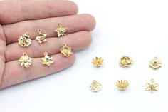 11x13mm 24k Shiny Gold Plated Tiny Birthflower with Birthstone Charm, Pave Birthflower Charm, Flower Birthstone Charm, Gold Plated Findings Material      : Brass Color           : 24k Shiny Gold Plated Size              : 11x13mm Hole Size    : 1.8mm Quantity      : Options All Our Birthstone Models https://www.etsy.com/shop/Goldjewelrysupplier?ref=seller-platform-mcnav&search_query=birthstone+charm All Our Zirconia Models https://www.etsy.com/shop/Goldjewelrysupplier?ref=seller-platform-mcnav&s Gold Flower Gemstone Jewelry, Gold Flower Shaped Jewelry With Gemstone, Gold Jewelry With Flower Charm For May Birthstone, Gold Flower-shaped Jeweled Jewelry, Gold Flower-shaped Gemstone Jewelry, Delicate 14k Gold-filled Jewelry With Flower Charm, Yellow Gold-plated Jewelry With Flower Charm, Elegant 14k Gold-filled Jewelry With Flower Charm, Gold Flower-shaped Charm Necklace With Birthstone