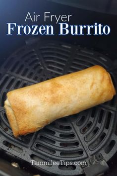 an air fryer filled with frozen burritos